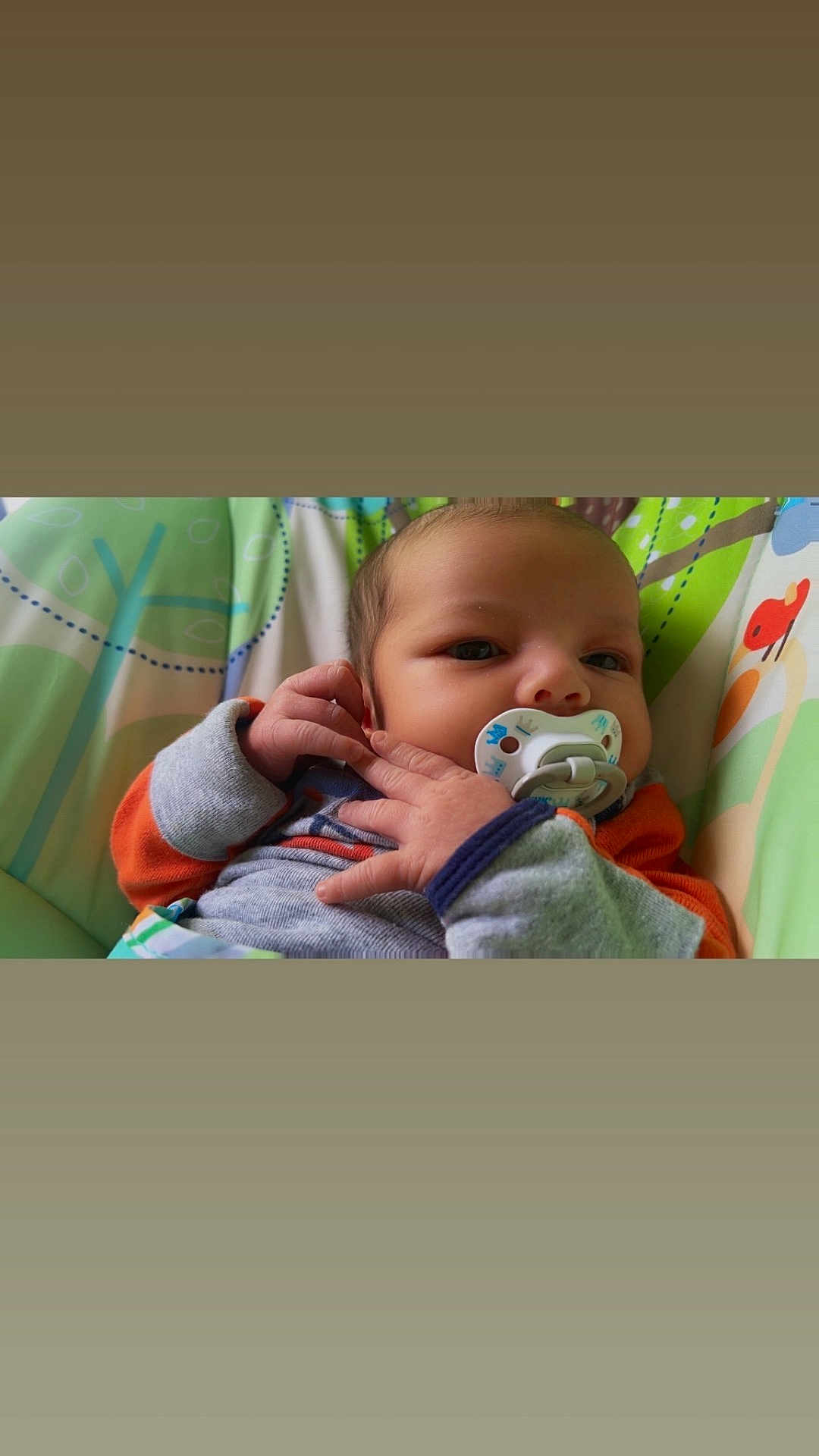 Dawson joined the competition — help win amazing prizes! baby, infant, pacifier, hand, face, clothing, cushion, patterned, colorful, comfort, cute, child, closeup, portrait, soft, indoor, resting, newborn, young, skin