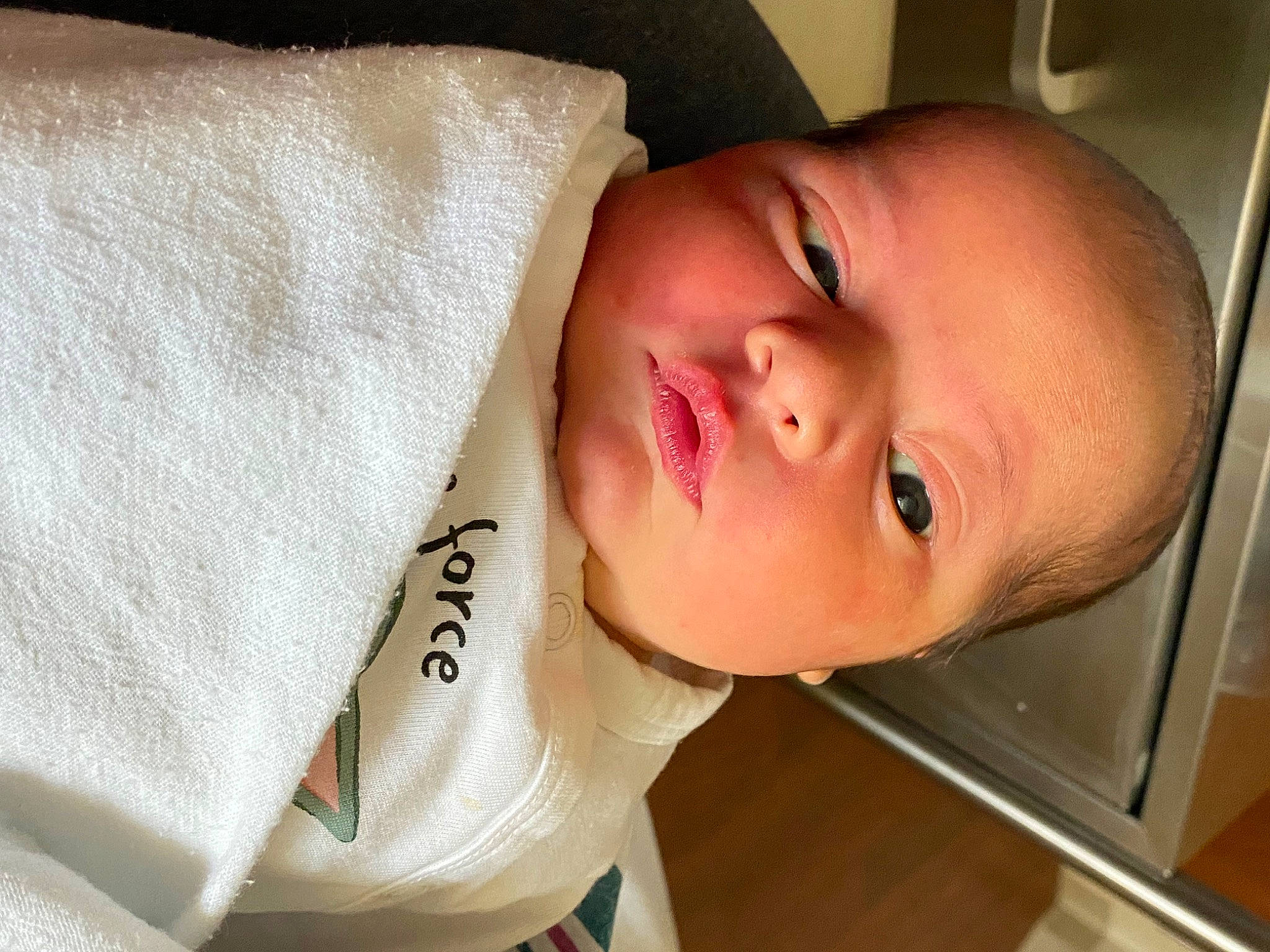 Asher is registered to the contest to win money with this photo: baby, baby_products, baby_toddler_clothing, cheek, child, chin, comfort, ear, eyebrow, eyelash, happy, linens, lip, nose, person, product, room, skin, sleeve, smile