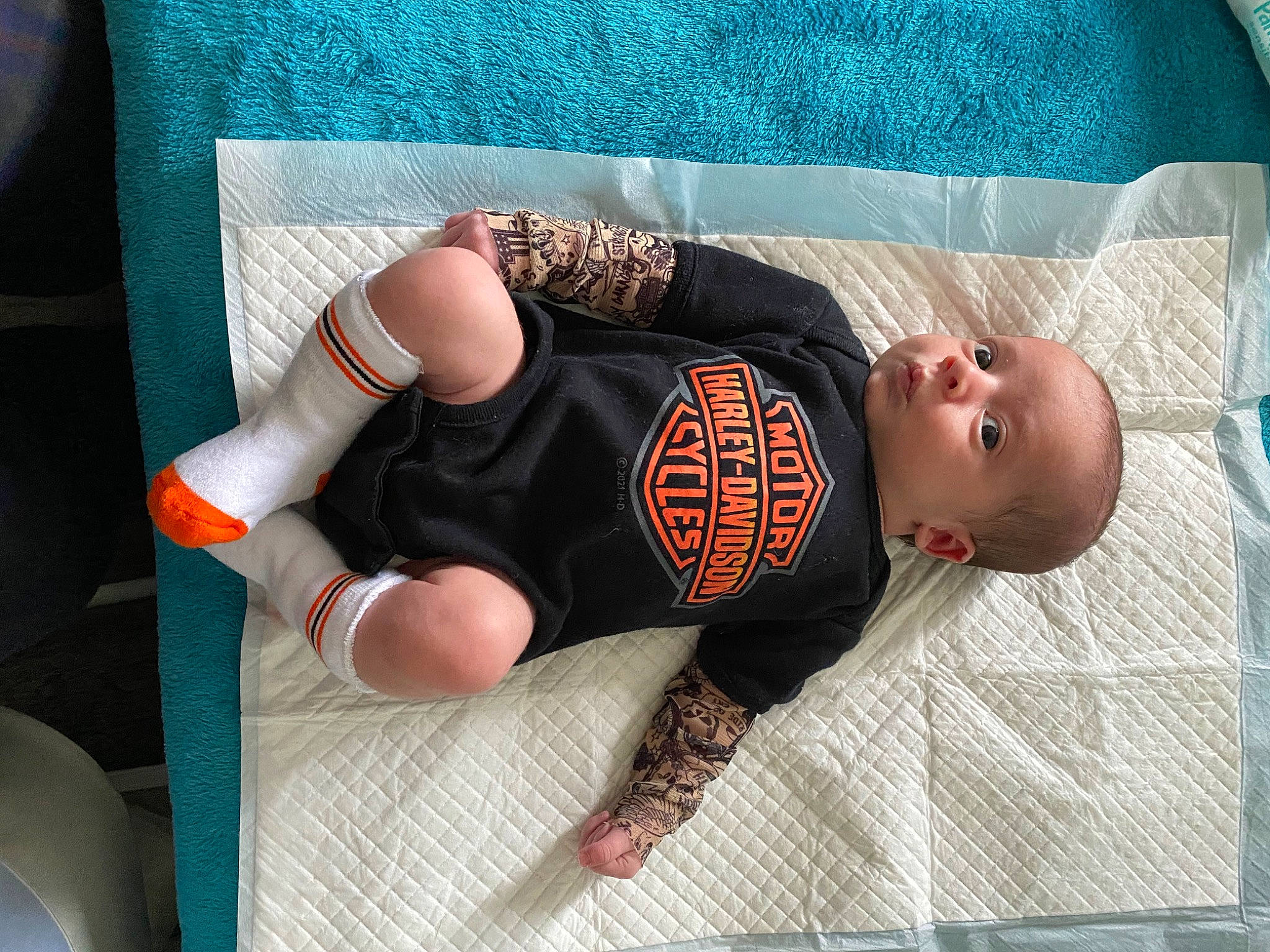 Asher joined the competition — help win amazing prizes! arm, baby, baby_products, baby_safety, baby_sleeping, baby_toddler_clothing, comfort, elbow, finger, hand, human_body, human_leg, knee, leg, pattern, person, sleeve, sock, thigh, toddler