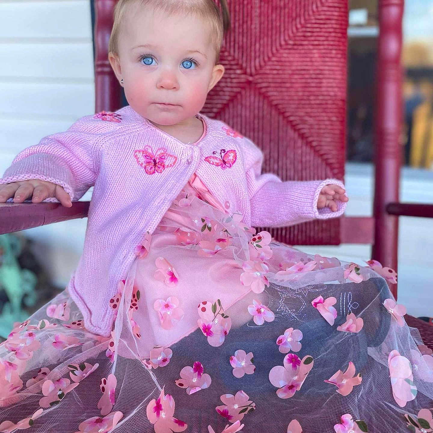 Reina joined the competition — help win amazing prizes! baby, brownhair, clothing, coat, dress, face, fashion, flower, formalwear, gown, hair, head, jacket, person, petal, photography, plant, portrait, sitting, sleeve