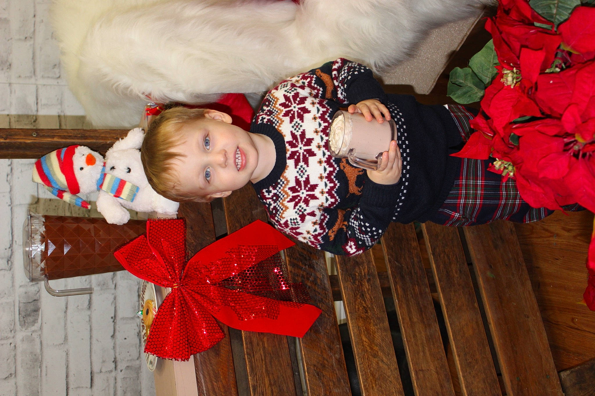 Everett is registered to the contest to win money with this photo: baby, baby_toddler_clothing, carmine, child, christmas, christmas_eve, dress, event, facial_expression, fun, happy, human_body, joy, pattern, person, pink, red, toddler, tradition, tree