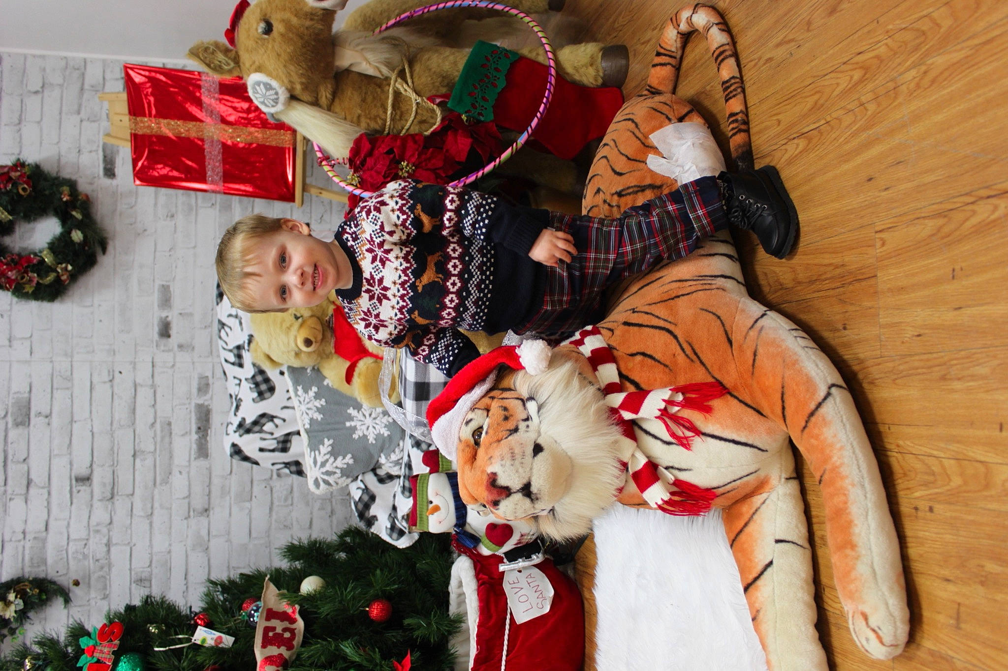 Everett joined the competition — help win amazing prizes! carmine, christmas, christmas_decoration, christmas_eve, christmas_ornament, costume, costume_design, event, fun, happy, holiday, joy, ornament, pattern, person, red, room, toy, tradition, tree