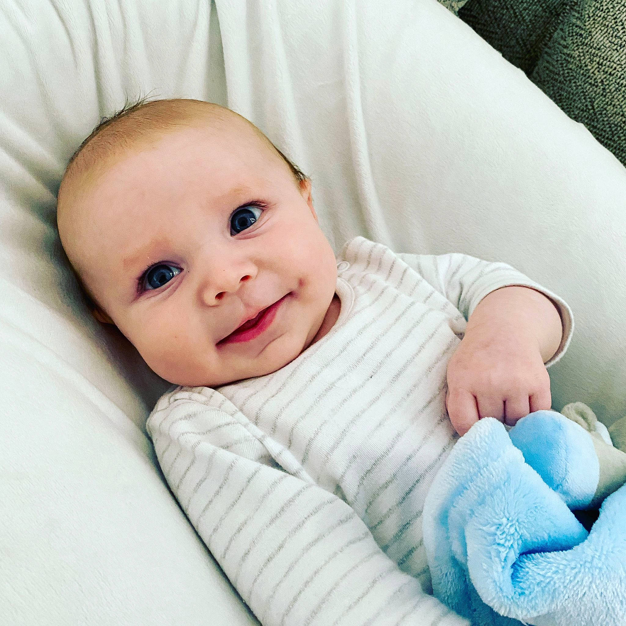 Finley joined the competition — help win amazing prizes! baby, baby_toddler_clothing, cheek, comfort, eye, face, facial_expression, grey, happy, head, iris, joy, linens, lip, nose, person, product, skin, sleeve, smile