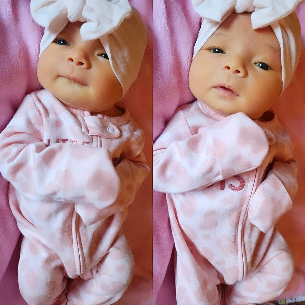 Ava joined the competition — help win amazing prizes! baby, baby_toddler_clothing, cap, cheek, child, doll, eye, eyelash, gesture, headgear, headwear, iris, lip, peach, person, pink, skin, sleeve, toddler, toy