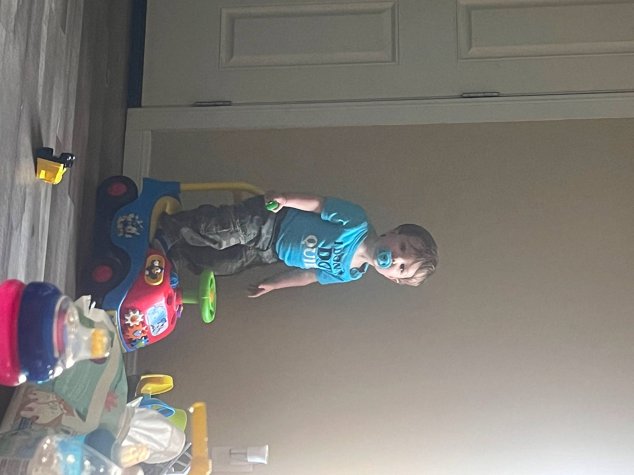 Elijah joined the competition — help win amazing prizes! arm, baby, curtain, door, elbow, electric_blue, flooring, fun, person, recreation, room, t_shirt, toddler, walking_shoe, wood