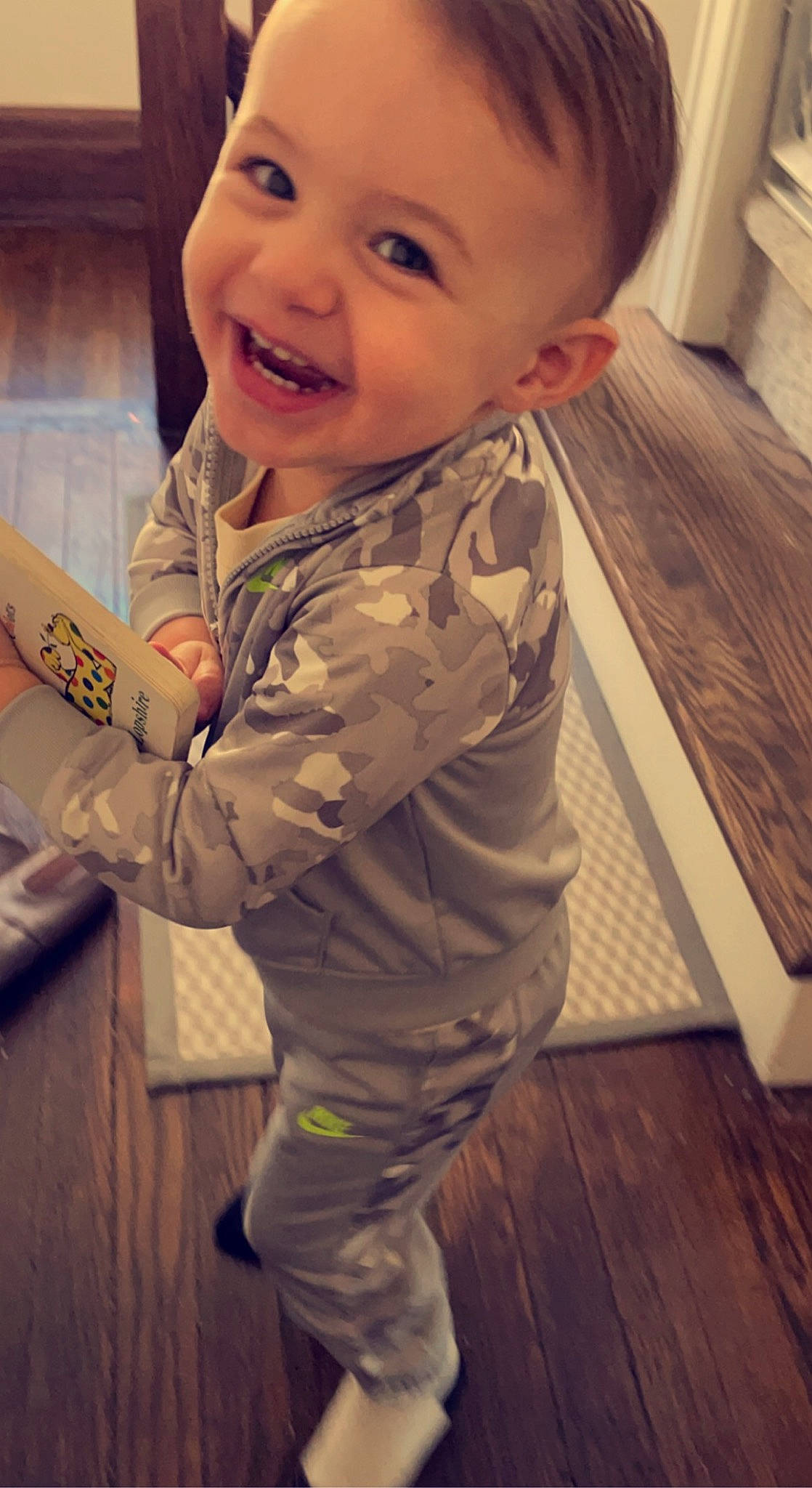 Remington is registered to the contest to win money with this photo: baby, baby_toddler_clothing, cheek, cool, eye, face, facial_expression, finger, gesture, hairstyle, happy, head, iris, joy, lip, mouth, nose, person, skin, sleeve