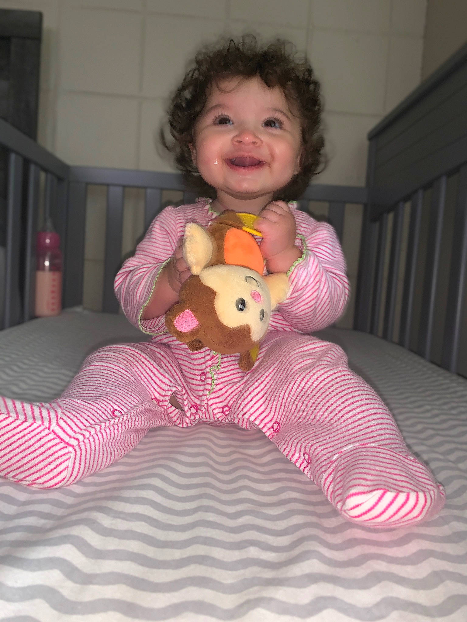 Michele joined the competition — help win amazing prizes! baby, baby_toddler_clothing, child, comfort, dress, eye, face, fawn, floor, flooring, head, joy, leg, person, pink, purple, skin, sleeve, smile, toddler