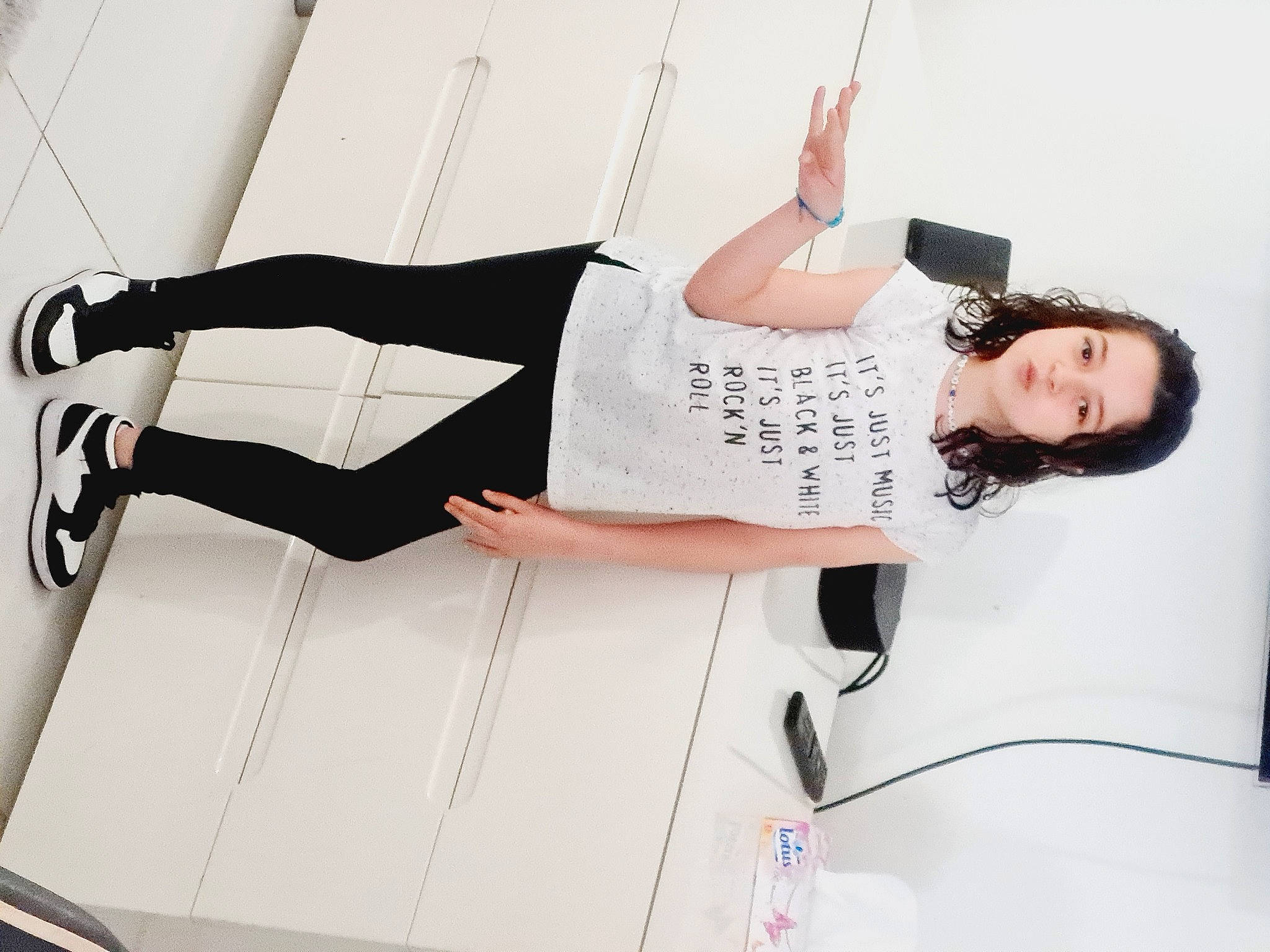 Oceane participe au concours pour gagner de l'argent avec cette photo : boot, comfort, dress, elbow, fashion_design, fashion_model, flash_photography, flooring, font, gesture, human_leg, joint, knee, leg, person, sitting, sleeve, sportswear, thigh, waist