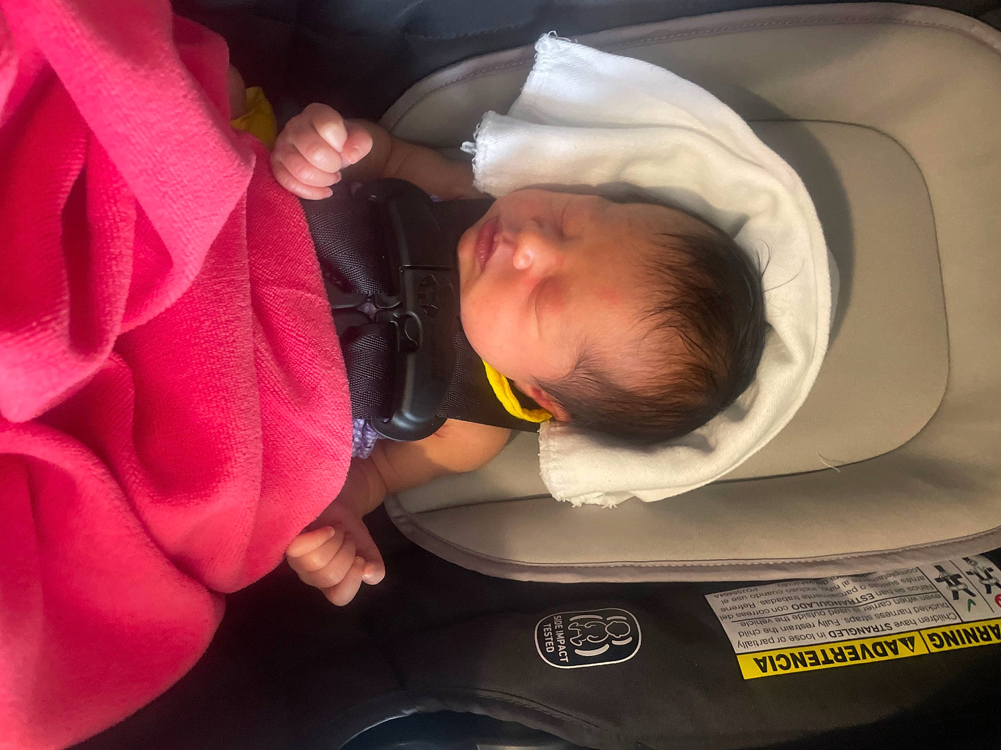 Eve is registered to the contest to win money with this photo: auto_part, automotive_design, automotive_exterior, automotive_lighting, automotive_tire, baby, baby_carriage, baby_in_car_seat, baby_products, baby_toddler_clothing, car_seat, child, comfort, finger, nail, person, petal, product, steering_wheel, toddler