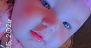 Emberlee is registered to the contest to win money with this photo: baby, baby_girl, child, closeup, clothing, cushion, date_overlay, eyes, face, flower, headband, indoors, infant, lips, pattern, person, pink, portrait, skin, soft_light