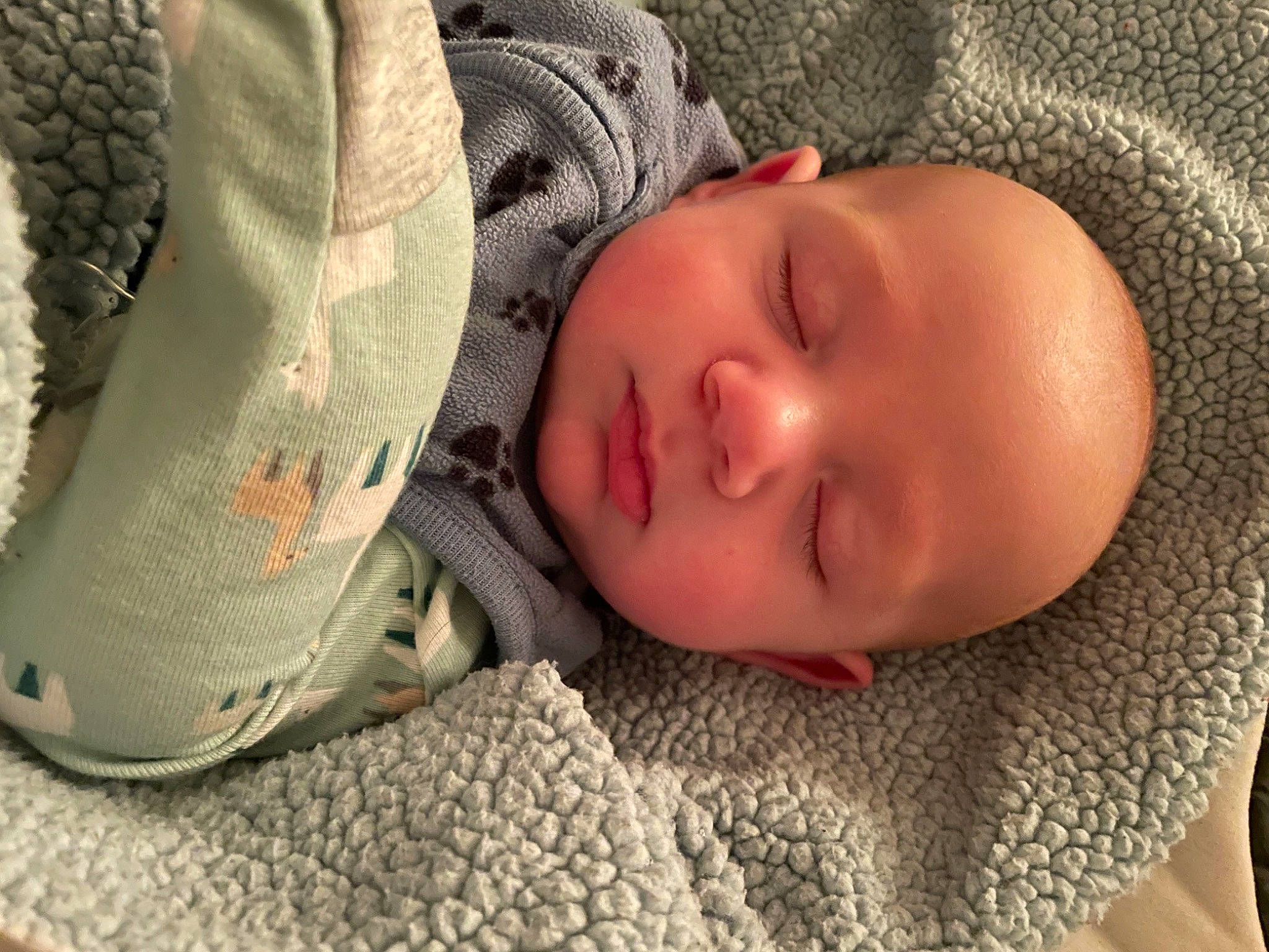 Easton joined the competition — help win amazing prizes! athletic_shoe, baby, baby_sleeping, baby_toddler_clothing, bedding, carmine, cheek, child, comfort, flooring, linens, nose, outdoor_shoe, pattern, person, skin, sleeve, textile, toddler, walking_shoe