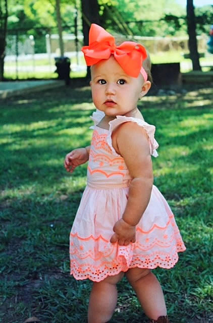 Kalli is registered to the contest to win money with this photo: baby, baby_toddler_clothing, beauty, child, child_model, clothing, dress, grass, hair_accessory, headband, headgear, headwear, peach, person, photograph, photography, pink, plant, ruffle, snapshot