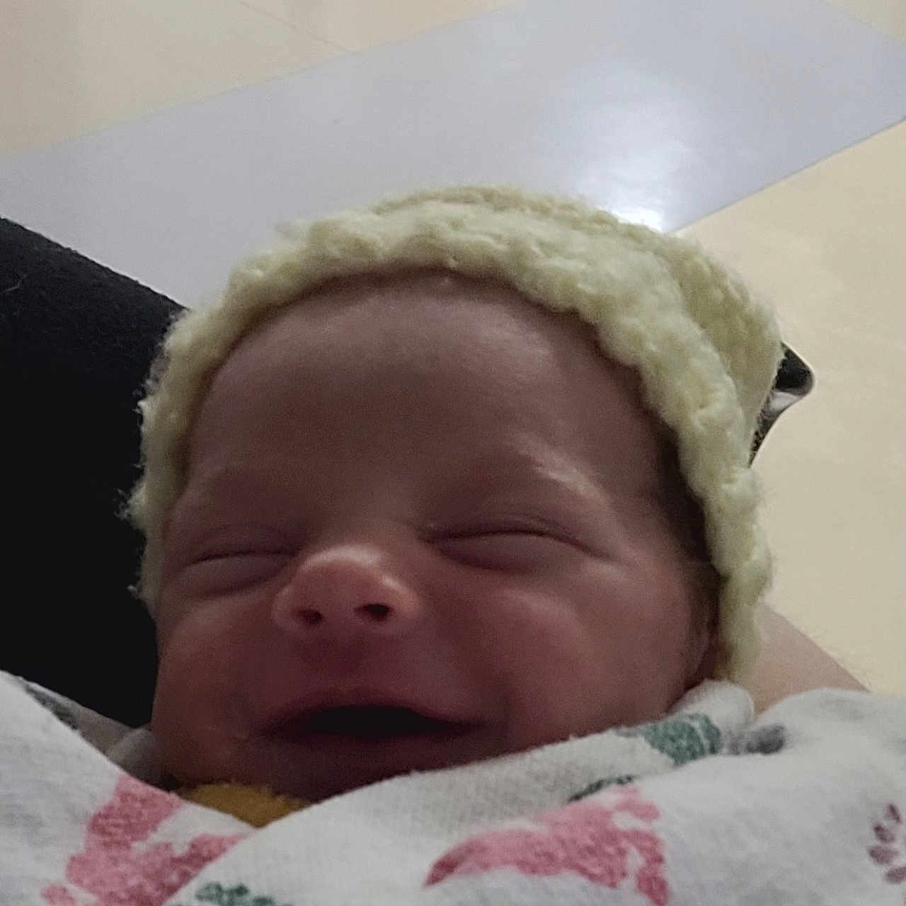 Vivian is registered to the contest to win money with this photo: architecture, baby, bed, blanket, bonnet, building, cap, clothing, face, furniture, glove, hat, head, hospital, newborn, person, photography, portrait, quilt, sleeping