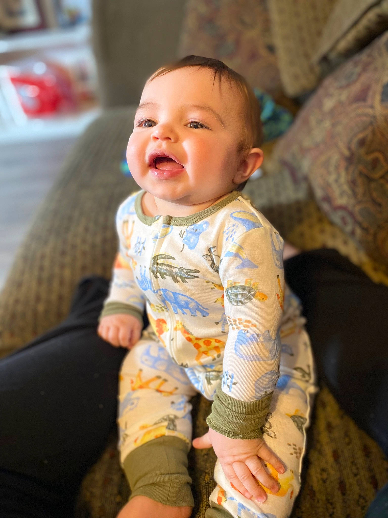 Maddix is registered to the contest to win money with this photo: baby, baby_toddler_clothing, cheek, child, comfort, eye, face, fun, happy, head, human_body, iris, mouth, nose, person, sitting, skin, sleeve, smile, t_shirt