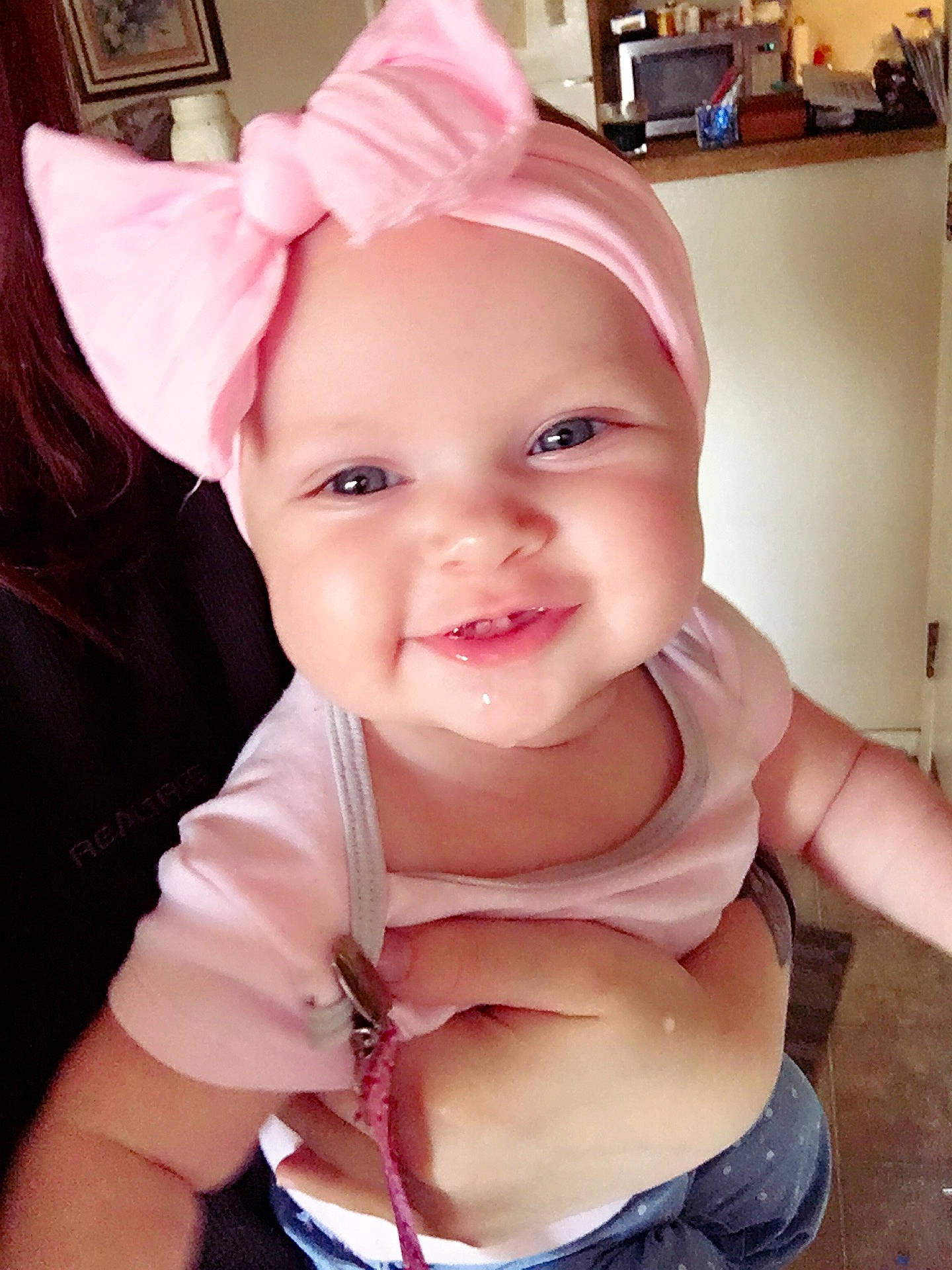 Anastasia is registered to the contest to win money with this photo: beauty, cheek, child, day, ear, eye, face, girl, hair_accessory, head, headgear, human_hair_color, infant, mouth, nose, person, pink, product, skin, smile