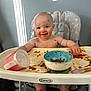 Emilia joined the competition — help win amazing prizes! baby, high_chair, messy, food, spaghetti, sauce, smiling, cup, bowl, spoon, child, indoor, feeding_time, happy, face, hands, tray, kitchen, graco, blue_bowl