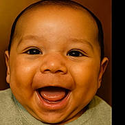 Luka is registered to the contest to win money with this photo: baby, smile, face, close_up, happy, infant, child, portrait, cute, expression, skin, eyes, mouth, tongue, cheeks, warm_lighting, background, clothing, young, person