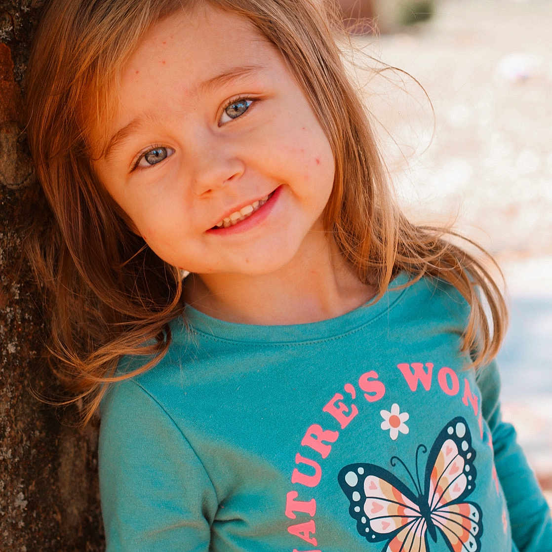 Izabella is registered to the contest to win money with this photo: applique, bodypart, child, clothing, face, female, girl, happy, head, knitwear, longsleeve, pattern, person, photography, portrait, sleeve, smile, sweater, sweatshirt, t_shirt