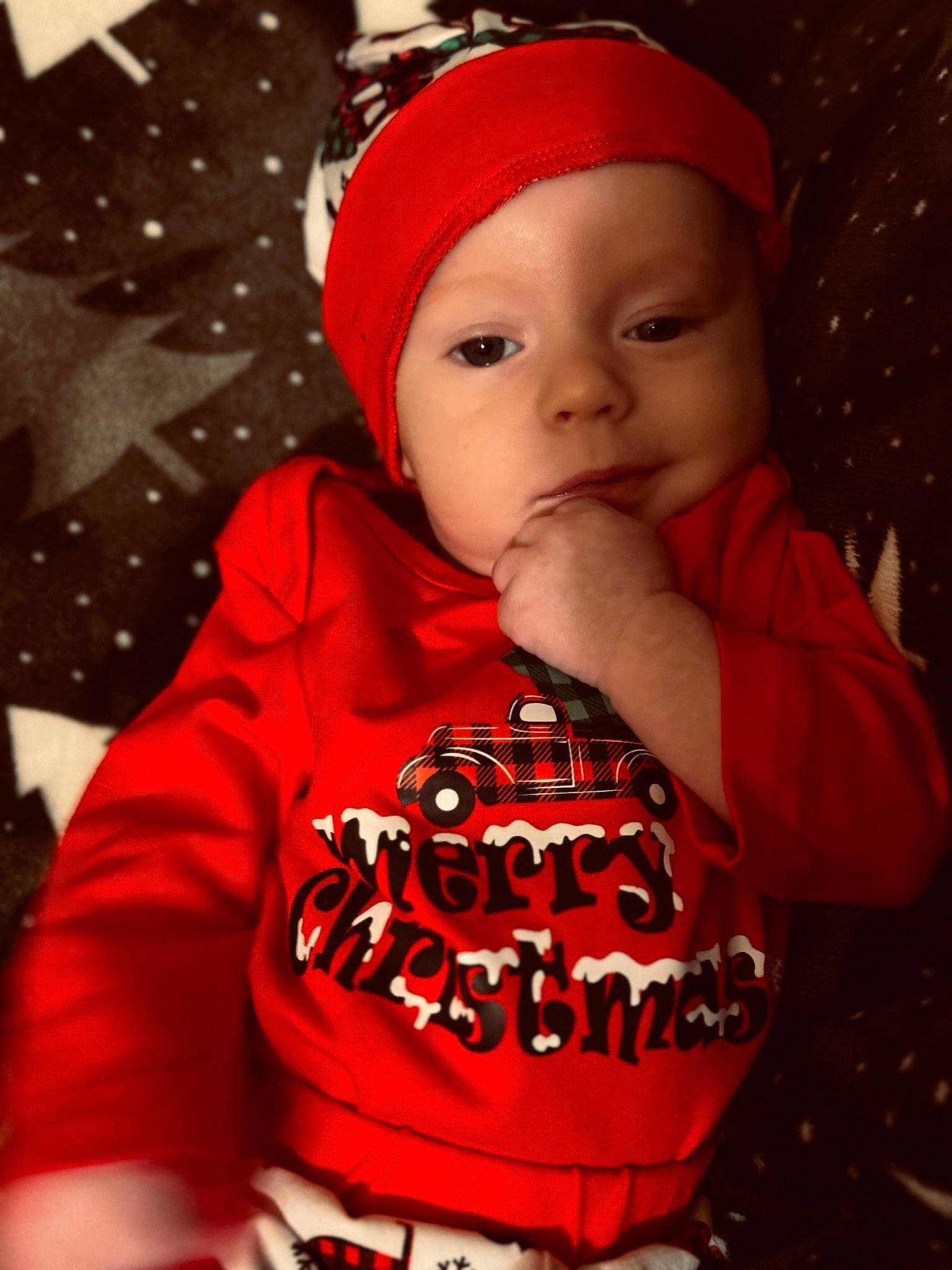 Paxton Shreve is registered to the contest to win money with this photo: baby, baby_toddler_clothing, cap, carmine, cheek, child, costume_hat, event, fictional_character, fun, happy, headwear, holiday, human_body, lip, outerwear, pattern, person, sleeve, t_shirt