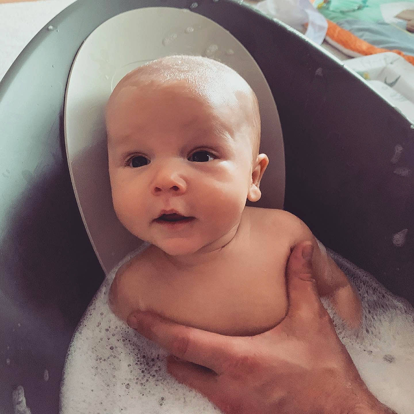 Reggie joined the competition — help win amazing prizes! baby, baby_bathing, bathing, cheek, chin, ear, eye, eyebrow, eyelash, face, forehead, head, human_body, iris, jaw, lip, mouth, neck, nose, person
