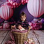 baby, basket, blanket, bouquet, child, flowers, floor, girl, happy, indoor, infant, person, plaid_shirt, portrait, purple, pink, props, toddler, wooden_floor, decor