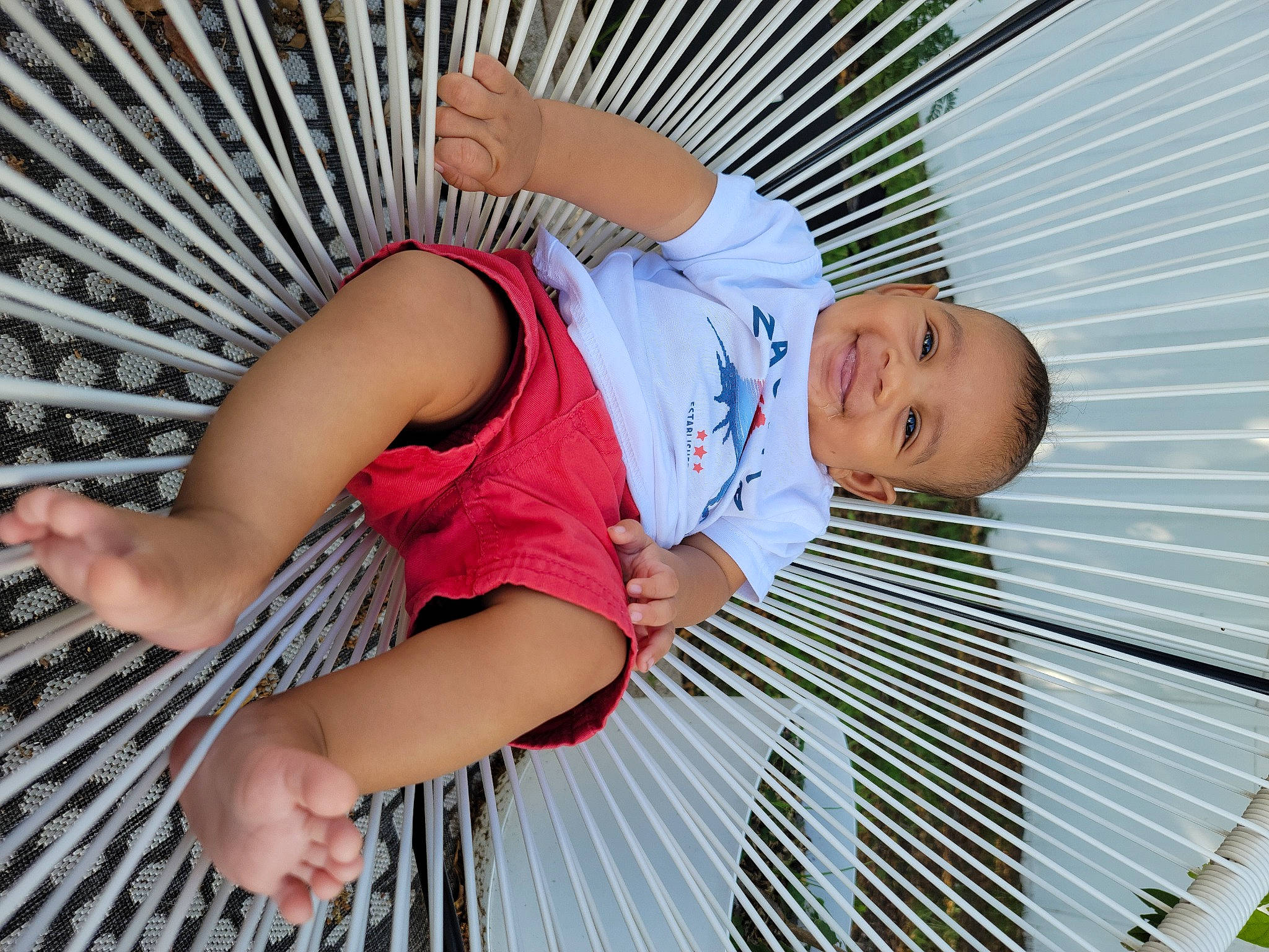 Cassius joined the competition — help win amazing prizes! baby, baby_toddler_clothing, child, comfort, elbow, foot, fun, grass, hammock, happy, human_body, human_leg, joint, joy, leg, leisure, person, shorts, skin, thigh