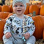 autumn, baby, background_blur, beanie, blue_eyes, child, cute, fall, festival, happy, mickey_mouse, outdoor, pacifier_clip, pumpkin, seasonal, sitting, smiling, soft_light, straw, striped_clothing
