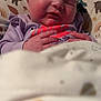 Bailey joined the competition — help win amazing prizes! baby, newborn, sleeping, infant, face, hand, clothing, blanket, pattern, bear, tree, cushion, cozy, indoors, portrait, child, cute, resting, soft, warm