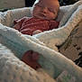 Bailey joined the competition — help win amazing prizes! baby, sleeping, blanket, pacifier, infant, cozy, soft, indoor, resting, child, cute, comfort, newborn, clothing, peaceful, face, head, wrapped, warm, nursery