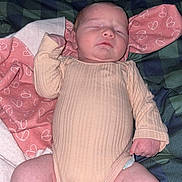 Bailey joined the competition — help win amazing prizes! baby, blanket, child, comfort, cute, diaper, hand, heart_pattern, indoors, infant, leg, newborn, onesie, peaceful, pink, plaid, resting, skin, sleeping, soft_fabric