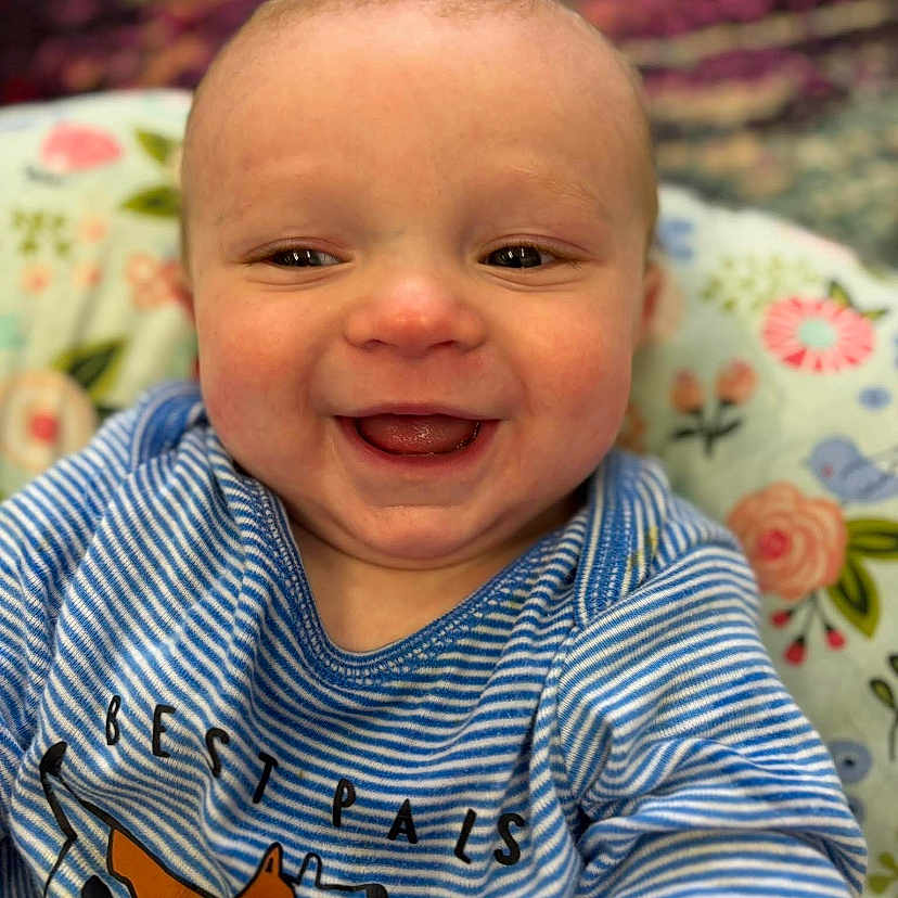 Willie is registered to the contest to win money with this photo: baby, babylaughing, bodypart, clothing, face, happy, head, homedecor, laughing, mouth, newborn, person, photography, portrait, selfie, shirt, sitting, smile, t_shirt, teeth