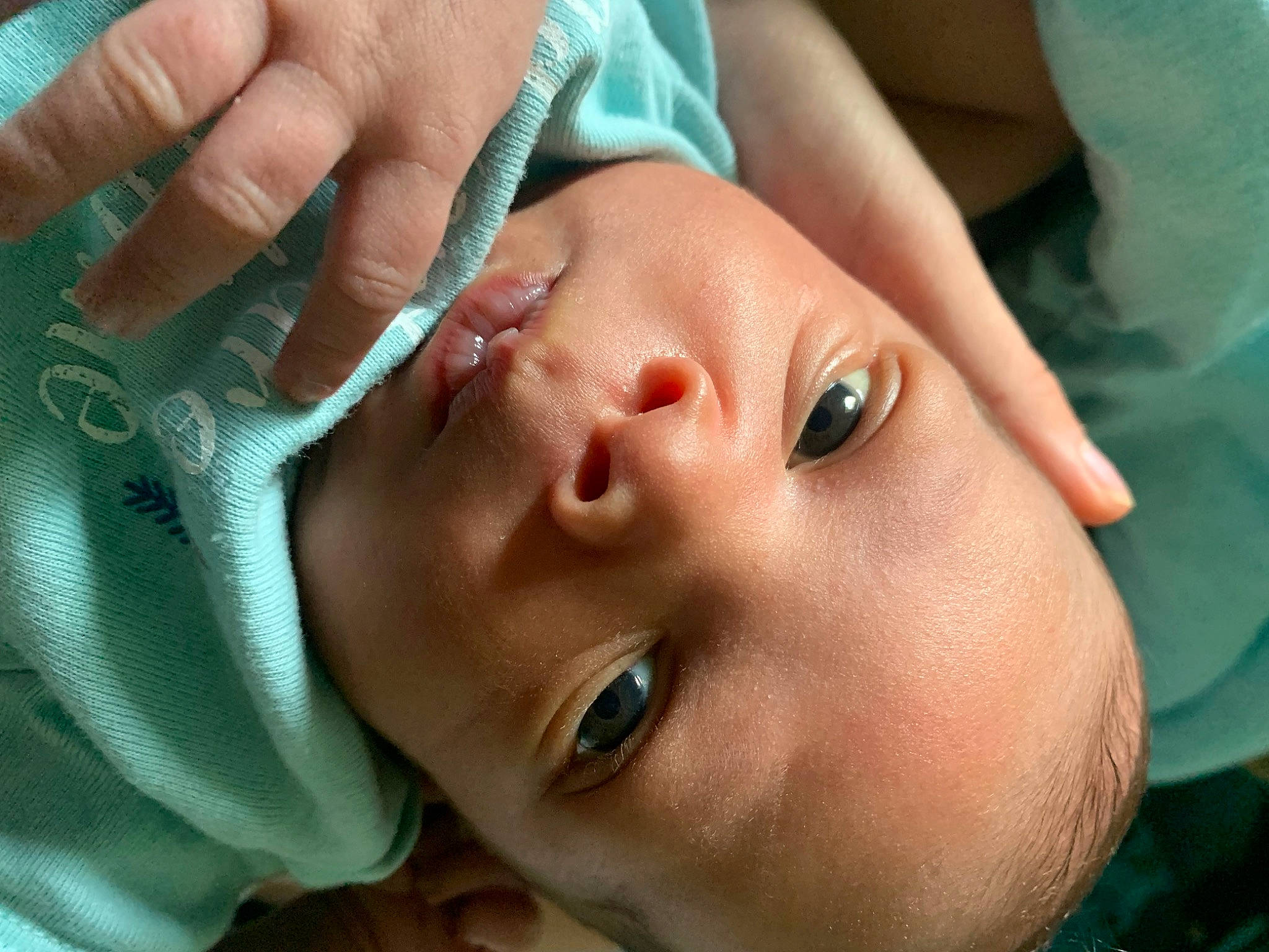 Zayhir is registered to the contest to win money with this photo: baby, cheek, chest, ear, eye, eyelash, finger, fluid, gesture, happy, human_body, lip, mouth, nail, neck, nose, person, skin, thumb, toddler