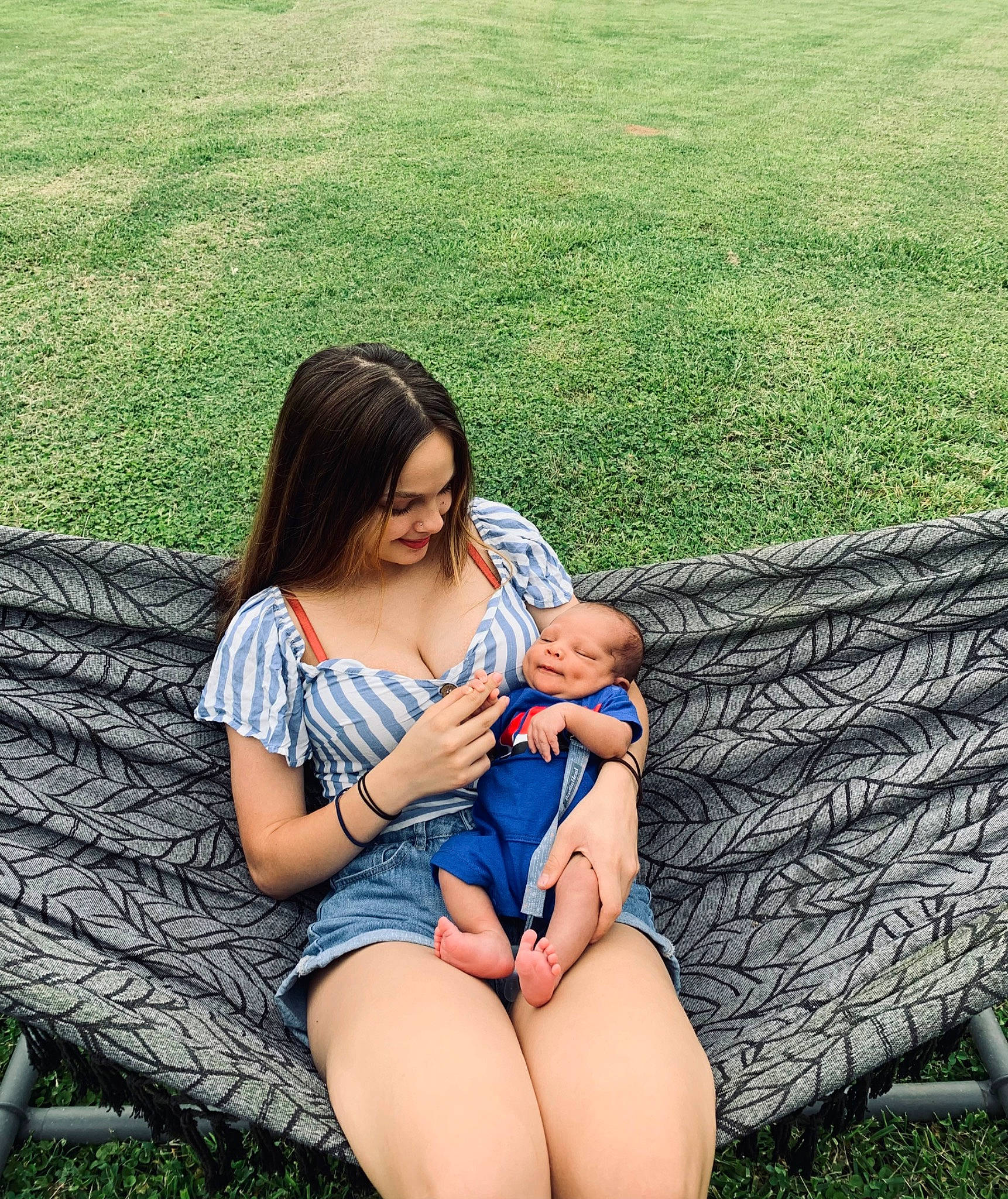 Zayhir joined the competition — help win amazing prizes! baby, fun, grass, grassland, green, hairstyle, happy, human_body, lap, leaf, leg, leisure, people, people_in_nature, person, photograph, plant, shorts, summer, sunlight