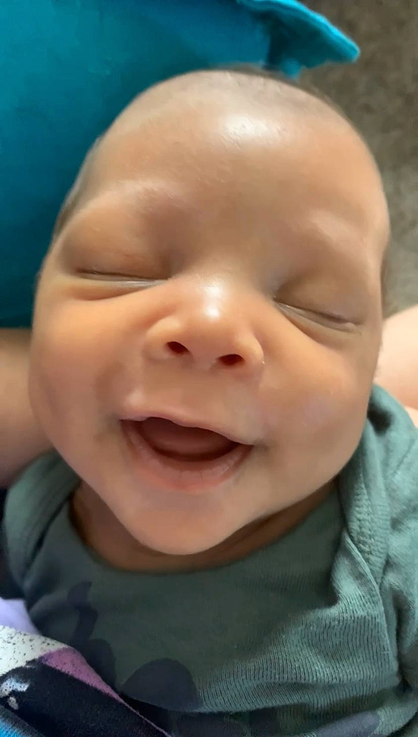 Zayhir is registered to the contest to win money with this photo: baby, baby_toddler_clothing, cheek, child, chin, close_up, ear, eyebrow, eyelash, fun, grass, happy, iris, lip, mouth, nose, person, skin, smile, toddler