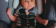 Zayla is registered to the contest to win money with this photo: baby, baby_clothes, black_bow, car_safety, car_seat, child, clothing, cute, footwear, headband, indoors, infant, person, portrait, safety, seat, seatbelt, socks, striped_shirt, young_child