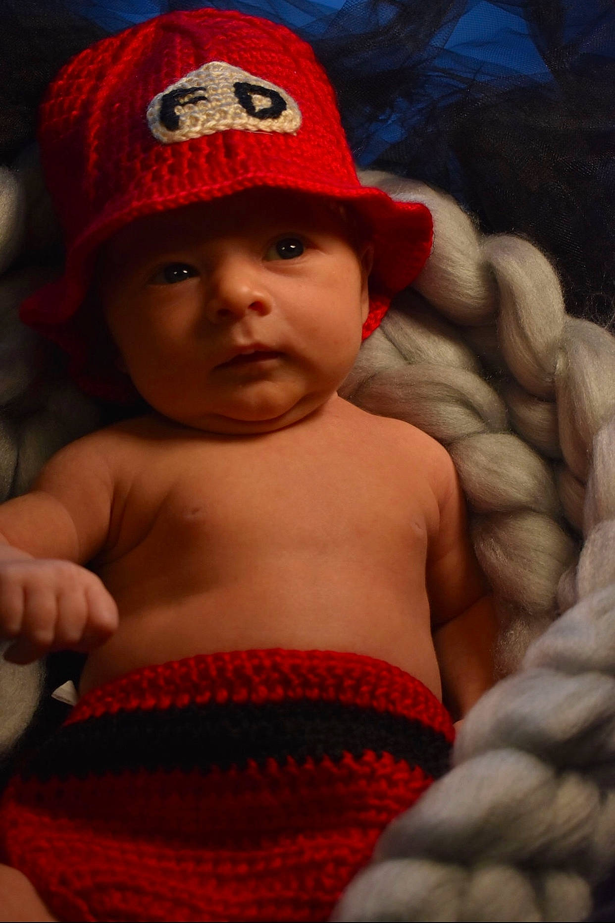 Konner joined the competition — help win amazing prizes! baby, cap, cheek, child, flesh, hat, headgear, headwear, male, muscle, person, red, skin, smile, toddler