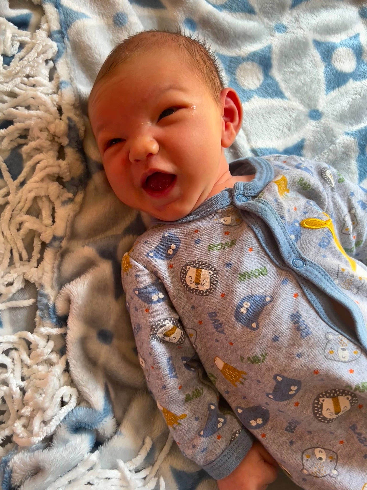 Rip is registered to the contest to win money with this photo: baby, baby_toddler_clothing, cheek, chin, comfort, eye, face, happy, head, human_body, iris, nose, outerwear, person, photograph, product, skin, sleeve, smile, textile