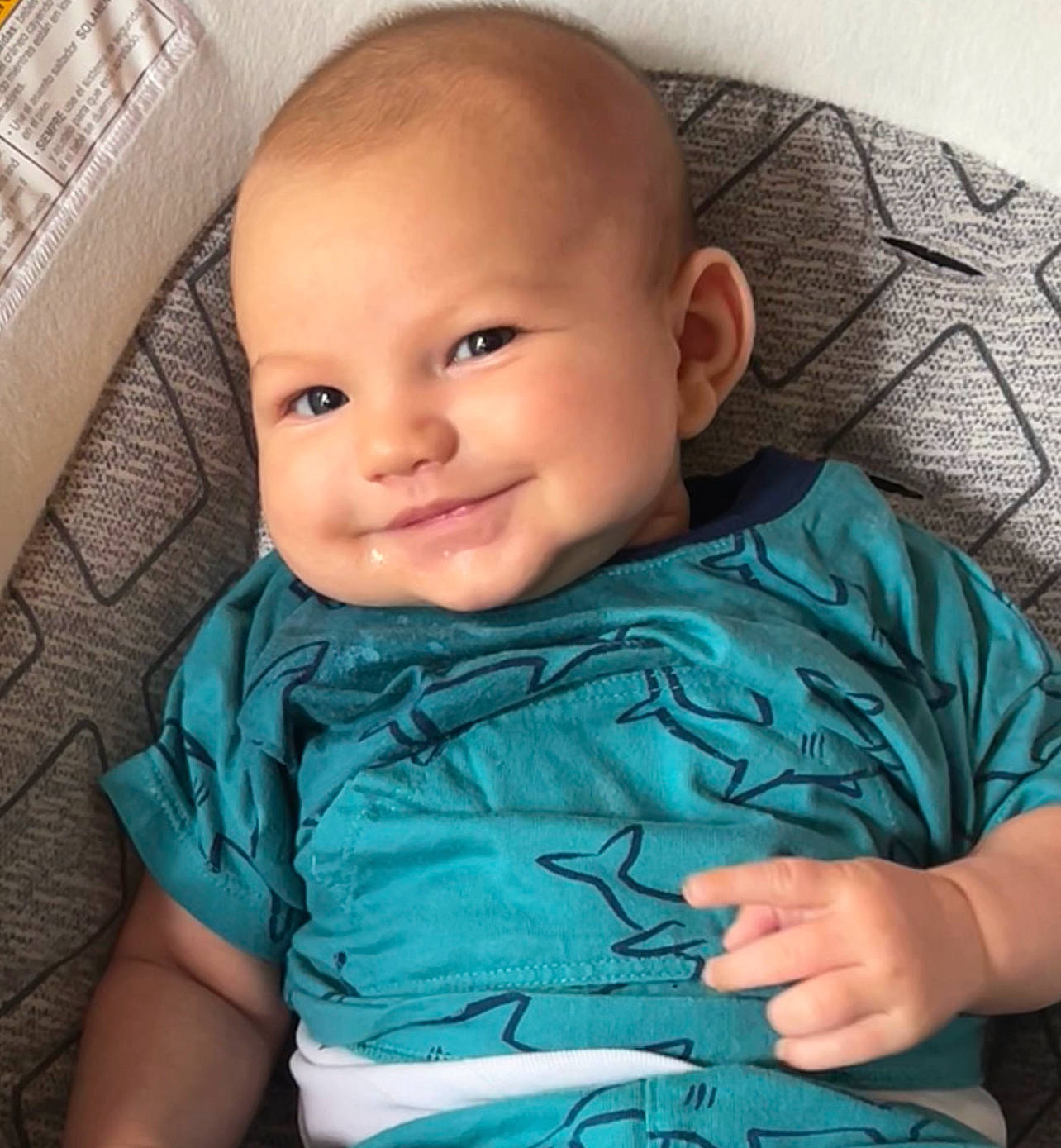 Rip is registered to the contest to win money with this photo: baby_toddler_clothing, blue, cheek, chin, comfort, eye, eyebrow, forehead, hairstyle, hand, happy, head, human_body, iris, joy, mouth, nose, person, product, skin