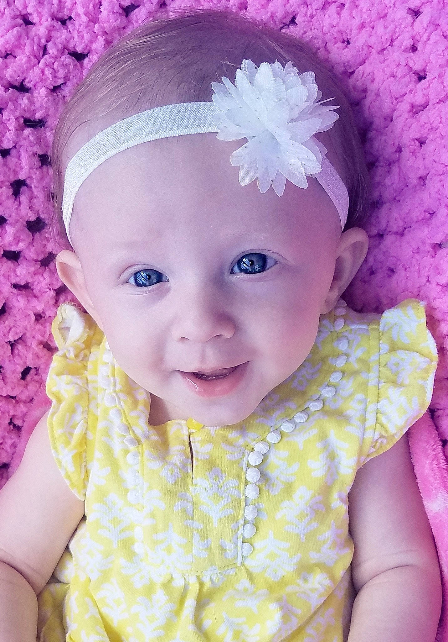 Ashlyn is registered to the contest to win money with this photo: baby, baby_toddler_clothing, cheek, child, child_model, eye, face, fashion_accessory, hair_accessory, head, headband, headgear, headwear, lavender, person, photography, pink, purple, skin, smile