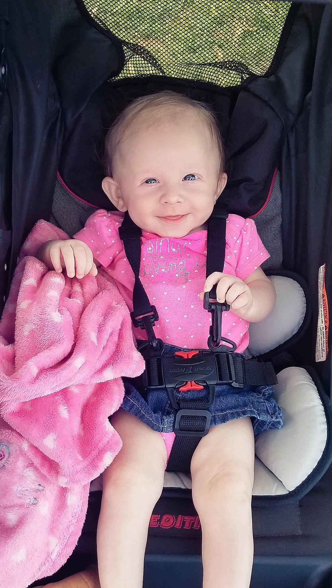 Ashlyn joined the competition — help win amazing prizes! baby, baby_carriage, baby_in_car_seat, baby_products, baby_toddler_clothing, beauty, car_seat, cheek, child, child_model, eye, finger, hand, joy, person, pink, product, sitting, skin, smile