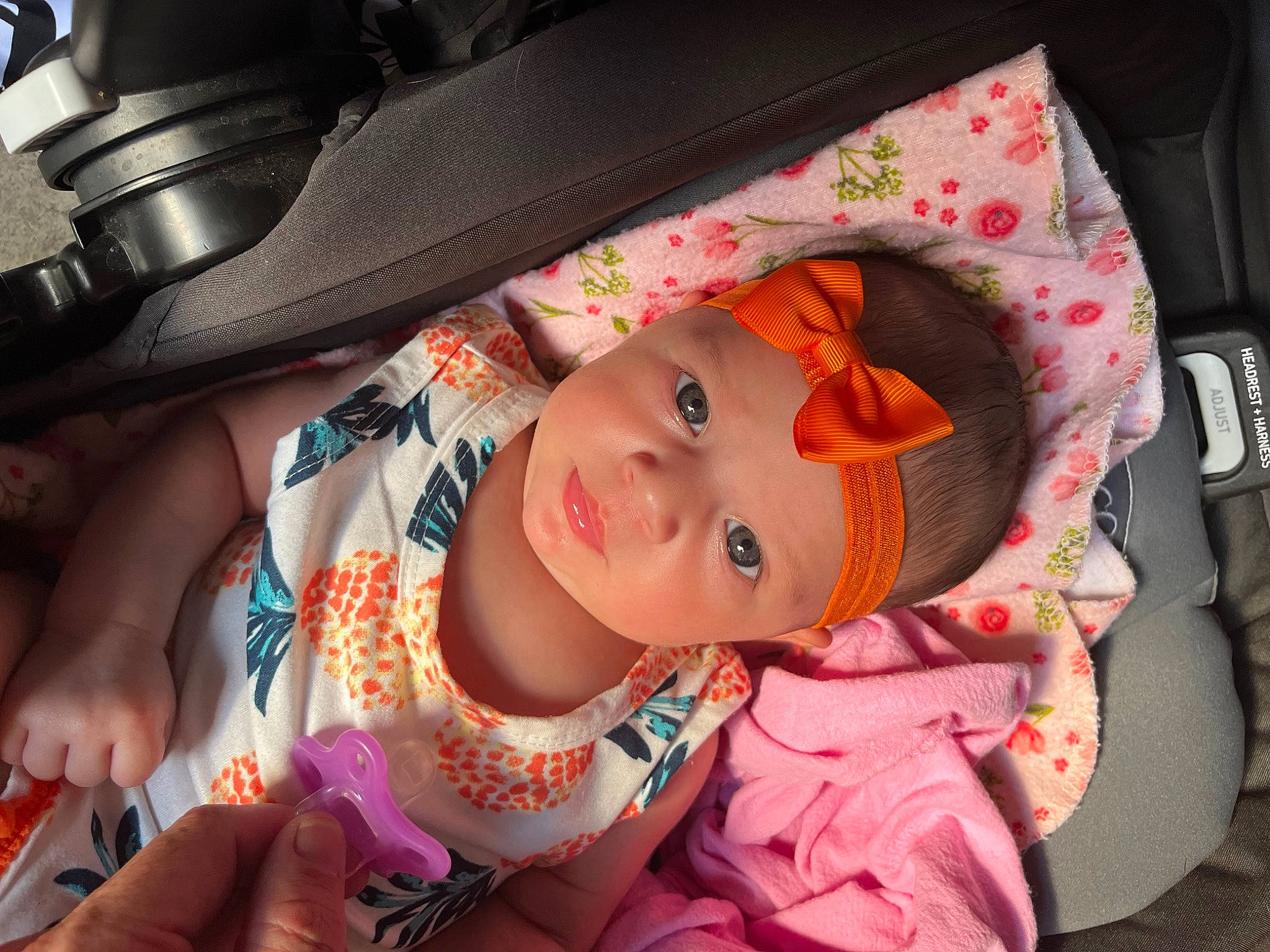 Kora-lynn is registered to the contest to win money with this photo: baby, baby_carriage, baby_products, baby_toddler_clothing, bag, car_seat, cheek, child, comfort, fashion_accessory, hand, headwear, person, pink, product, room, toddler, vacation