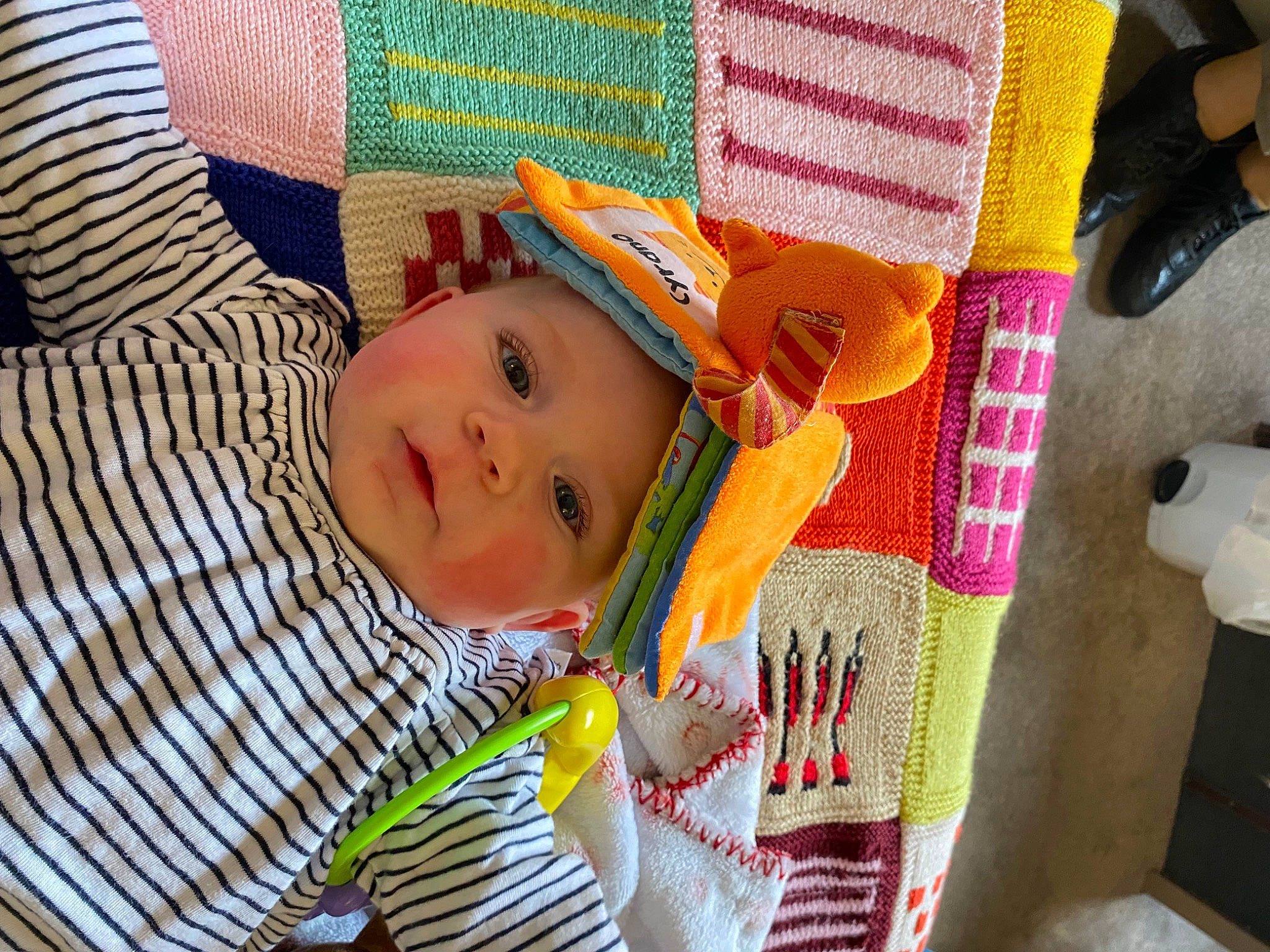 Julia participe au concours pour gagner de l'argent avec cette photo : art, baby, baby_products, baby_toddler_clothing, cheek, child, comfort, fun, happy, head, headwear, linens, pattern, person, room, stuffed_toy, textile, toddler, toy, wood