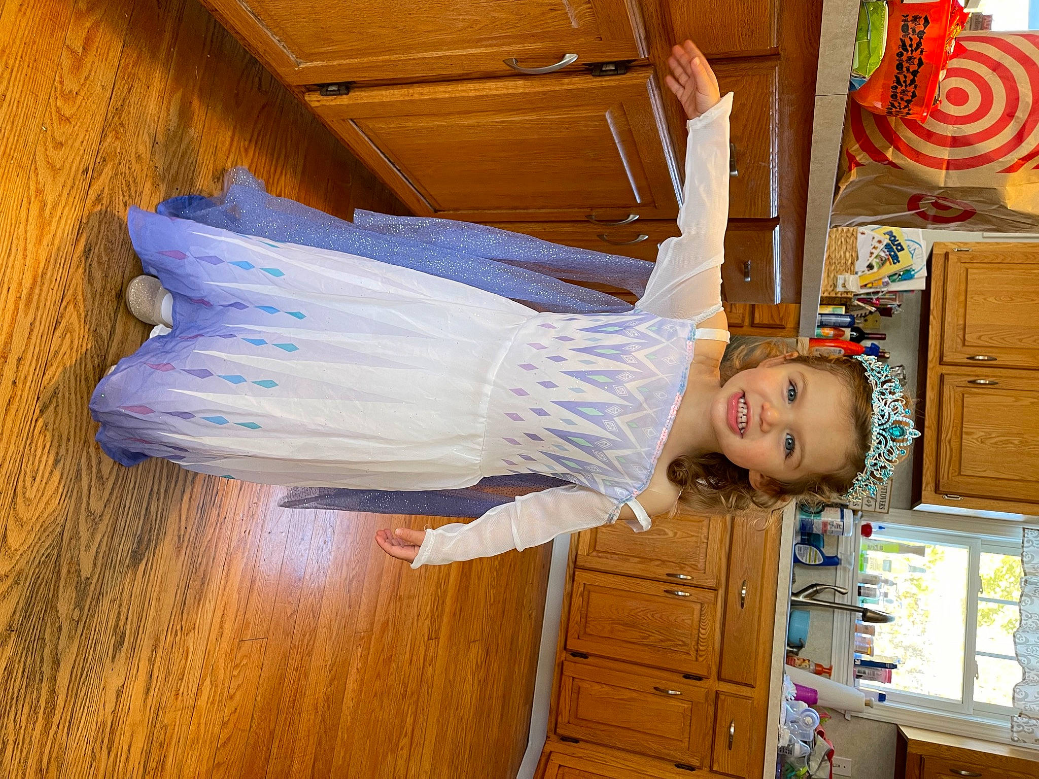 Natalie joined the competition — help win amazing prizes! baby_products, cabinetry, chest_of_drawers, child, comfort, cupboard, door, drawer, flooring, fun, happy, hardwood, human_leg, joy, person, room, smile, standing, toddler, waist