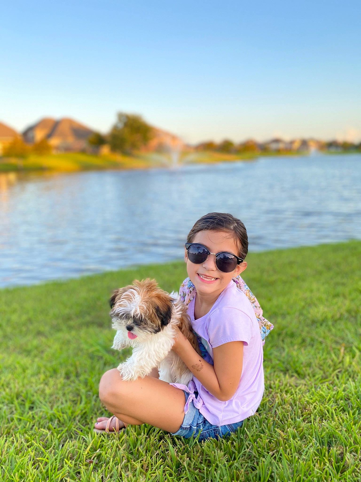 Evangeline joined the competition — help win amazing prizes! carnivore, dog, eyewear, face, glasses, goggles, grass, green, happy, joy, lake, leisure, nature, people_in_nature, person, plant, sky, smile, sunglasses, sunlight