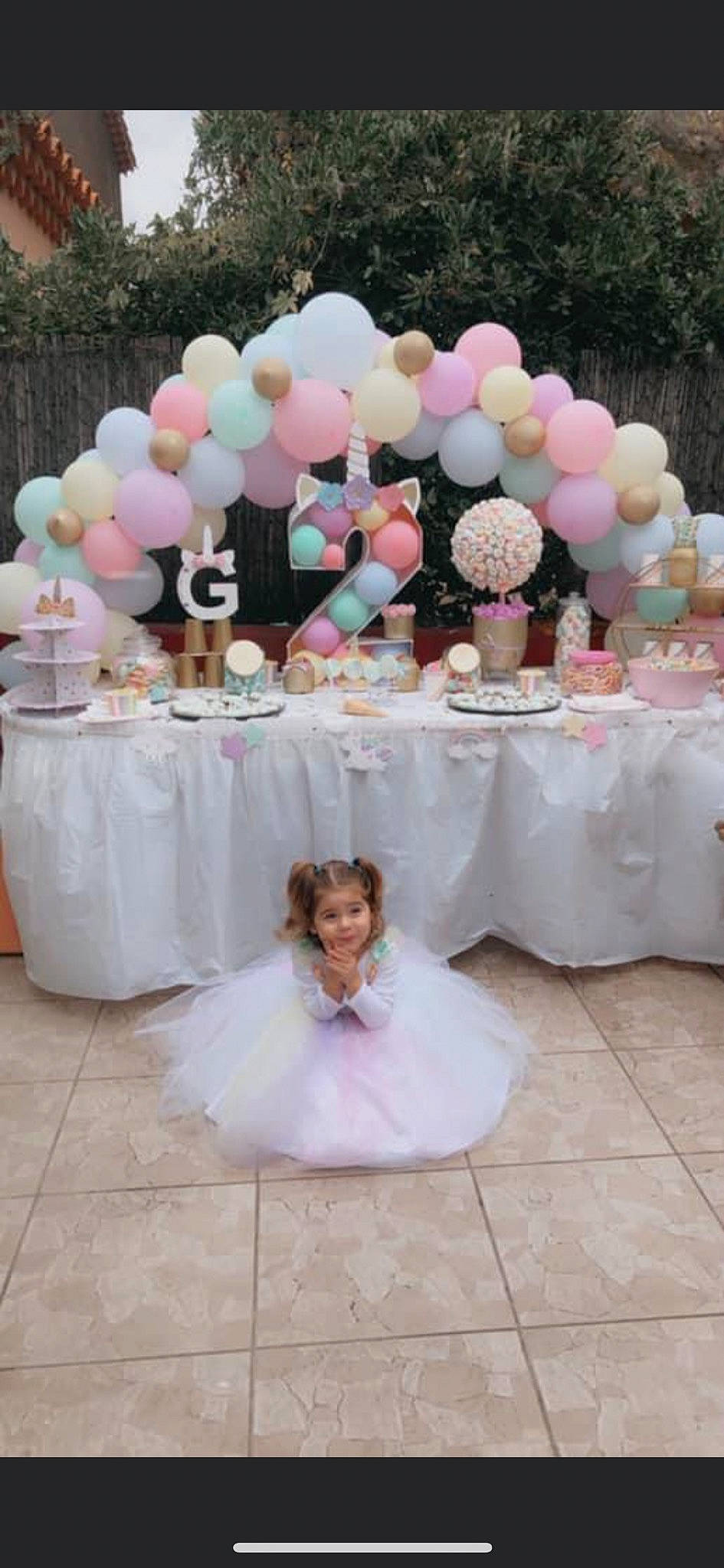 Gabriella participe au concours pour gagner de l'argent avec cette photo : arch, architecture, baby_shower, balloon, banquet, centrepiece, ceremony, decoration, event, function_hall, party, party_favor, party_supply, person, petal, pink, table, tablecloth, tableware, wedding_ceremony_supply