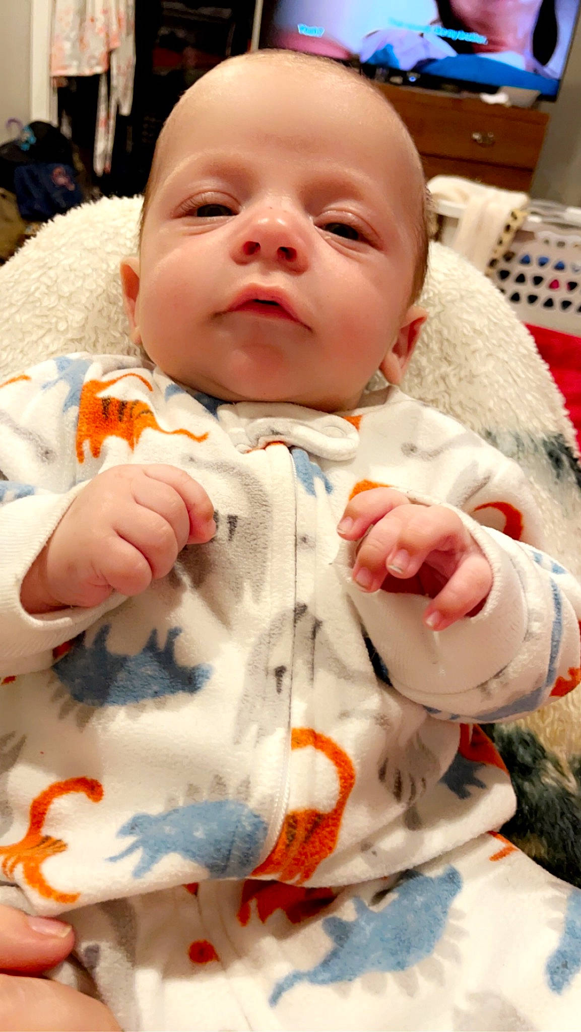 Loki is registered to the contest to win money with this photo: baby, baby_toddler_clothing, bib, cheek, child, chin, collar, comfort, face, finger, happy, lip, mouth, nose, person, pink, skin, sleeve, thumb, toddler