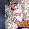 baby, newborn, pacifier, sleeping, white_clothing, blanket, pillow, bed, indoor, infant, rest, comfort, cute, peaceful, soft, person, human, small, skin, sleep
