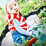 Hunter joined the competition — help win amazing prizes! blanket, blue_jeans, brown_shoes, child, curious_expression, cute, daylight, flowers, greenery, nature, number_one, outdoor, party_hat, plants, portrait, red_vest, sitting, soft_focus, striped_shirt, toddler