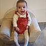Maëva a rejoint le concours — aidez-le/la à gagner de superbes lots ! baby, child, smiling, happy, indoor, armchair, clothing, romper, tights, face, person, cute, infant, furniture, expression, sitting, joy, small, skin, head