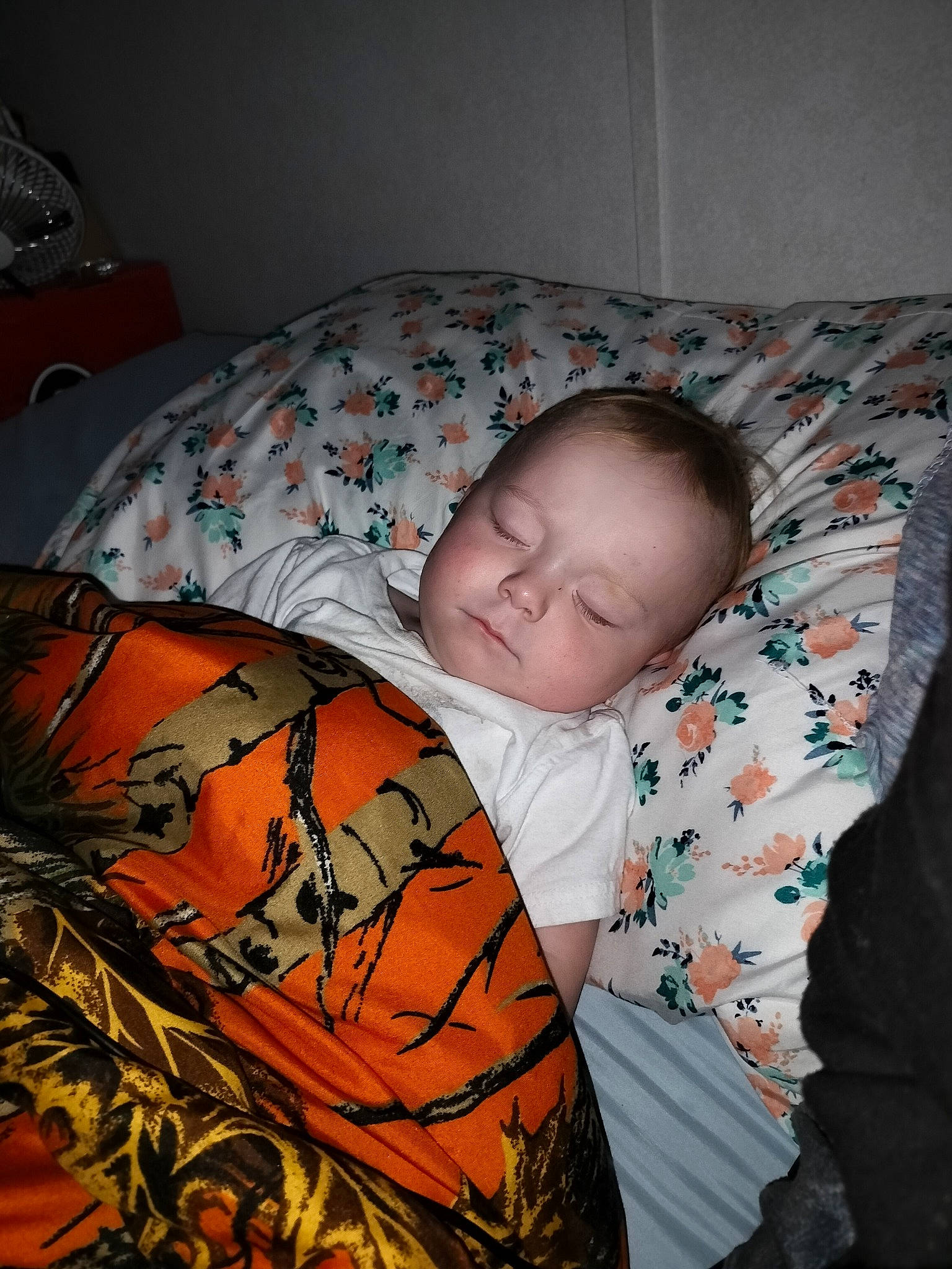 Jordan is registered to the contest to win money with this photo: baby, baby_toddler_clothing, bedding, bedtime, child, comfort, flesh, linens, mouth, nap, pattern, person, room, sitting, sleep, sleeve, toddler